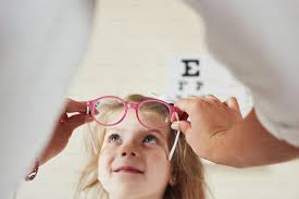 girl wearing pink glasses